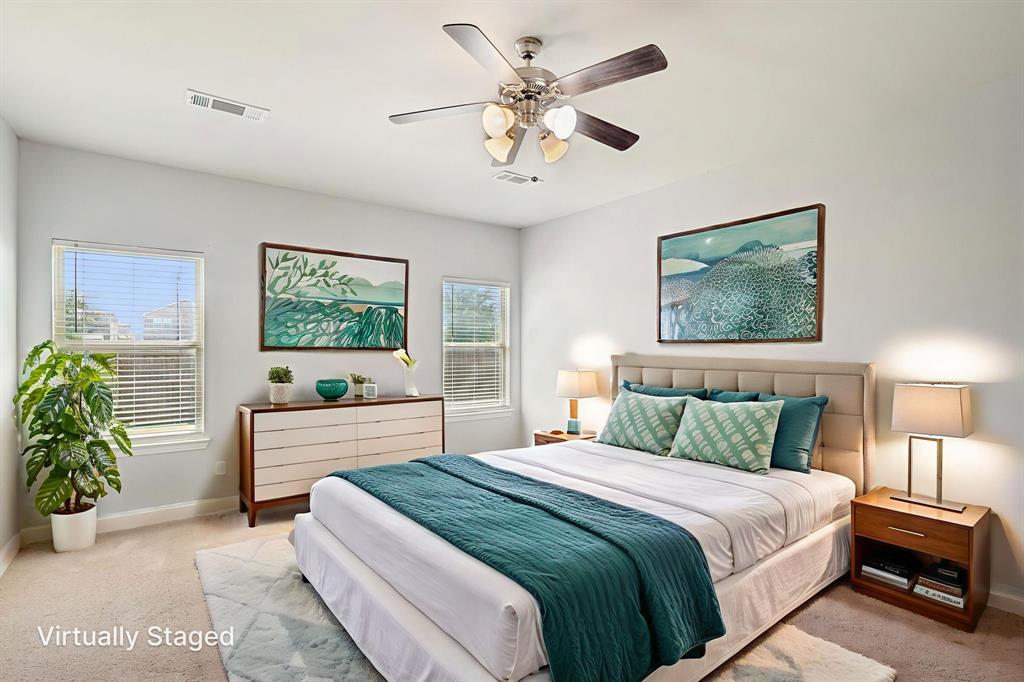 2321 Mount Olive Lane Forney, TX 75126 - Photo 16 of 35 Bedroom with carpet floors and a ceiling fan