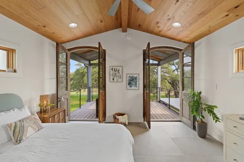 a view of balcony with wooden floor