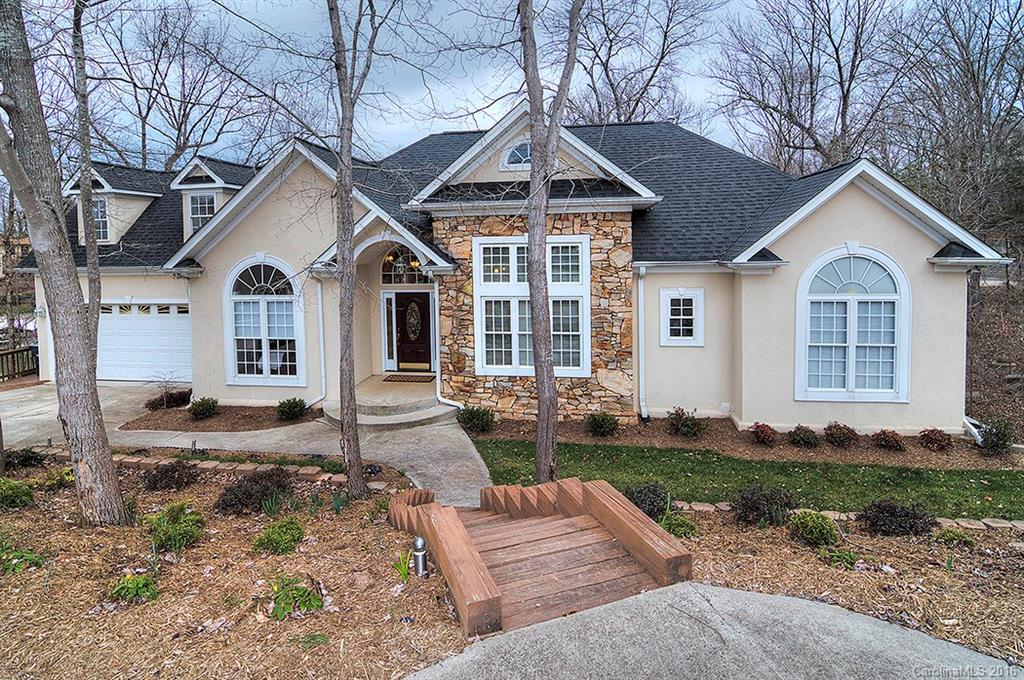 29023 Beaver Run Tega Cay, SC 29708 - Photo 2 of 24 a front view of a house with a yard