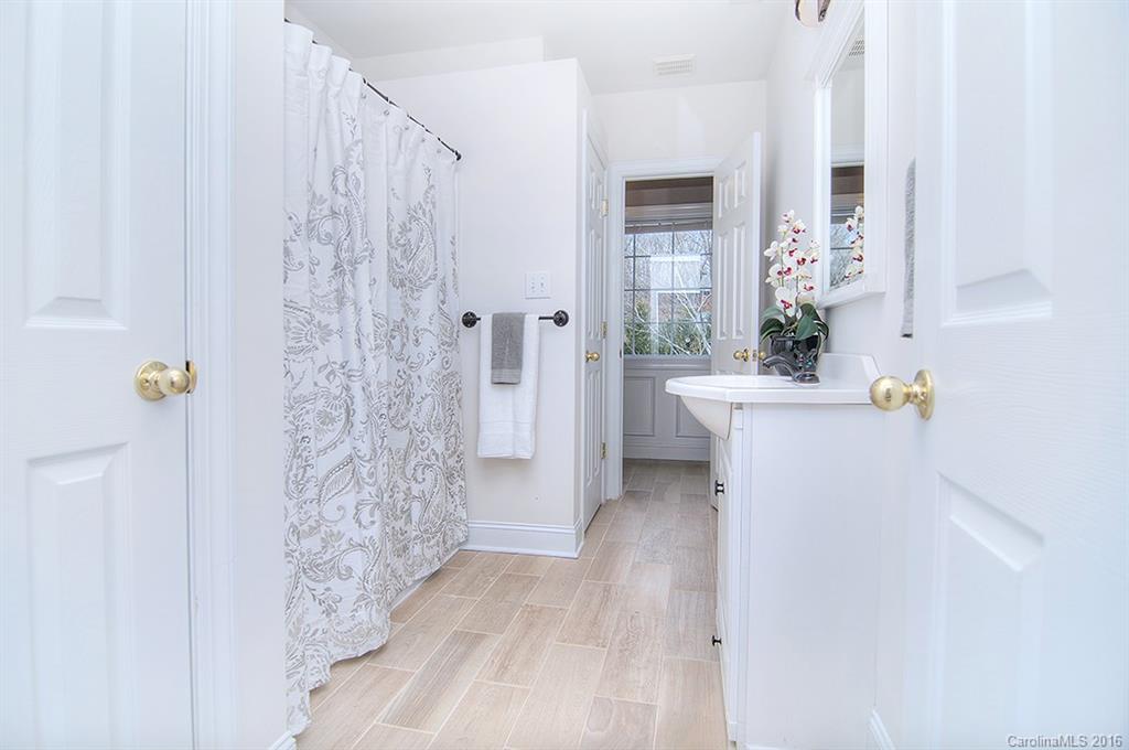 29023 Beaver Run Tega Cay, SC 29708 - Photo 12 of 24 a view of bathroom with bathtub and shower