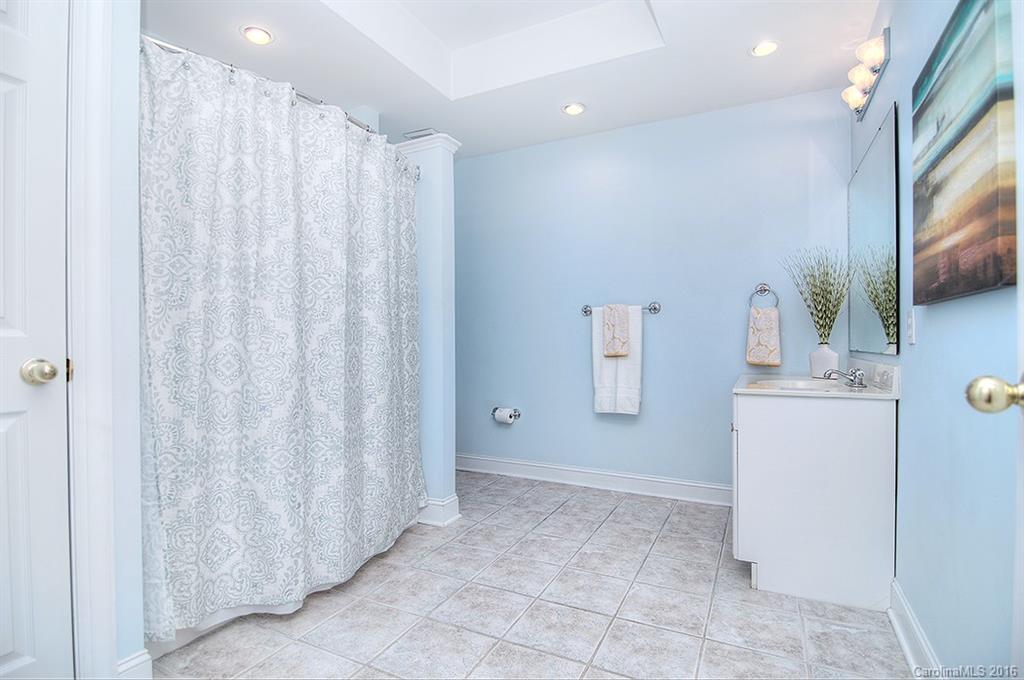 29023 Beaver Run Tega Cay, SC 29708 - Photo 15 of 24 a bathroom with a sink and a mirror