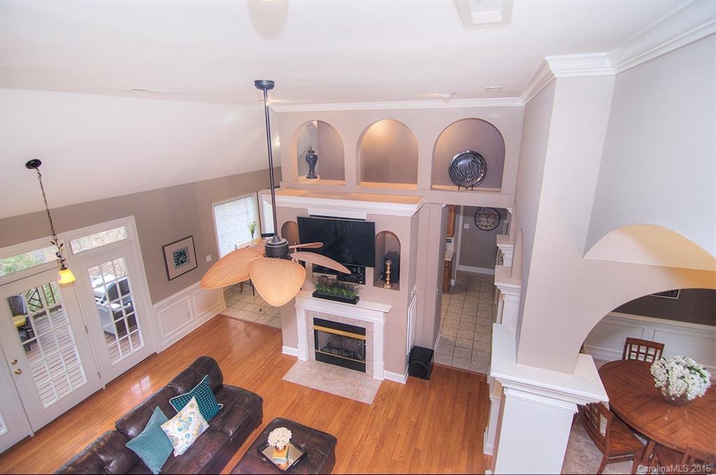 29023 Beaver Run Tega Cay, SC 29708 - Photo 6 of 24 a living room with furniture and a fireplace