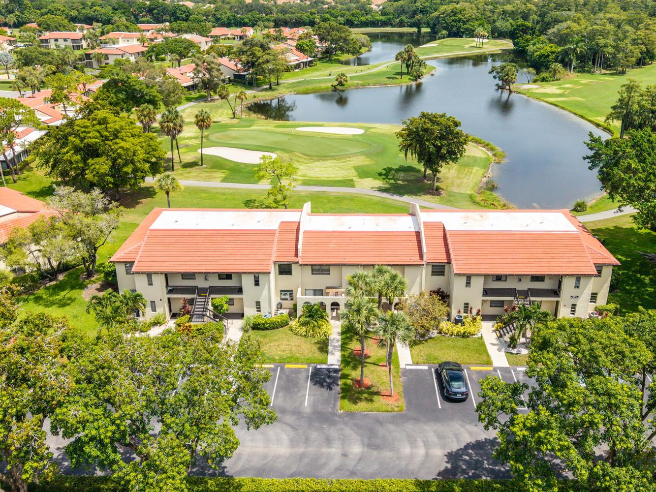 8425 Casa Del Lago, Unit H Boca Raton, FL 33433 - Photo 1 of 42 002-016-Neighborhood-1334x1000