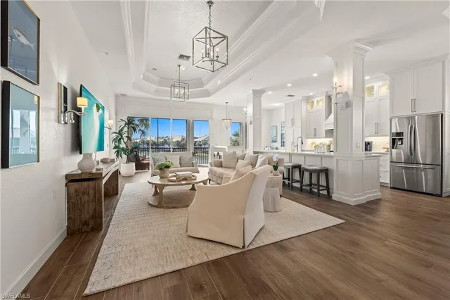 a view of a kitchen and dining room
