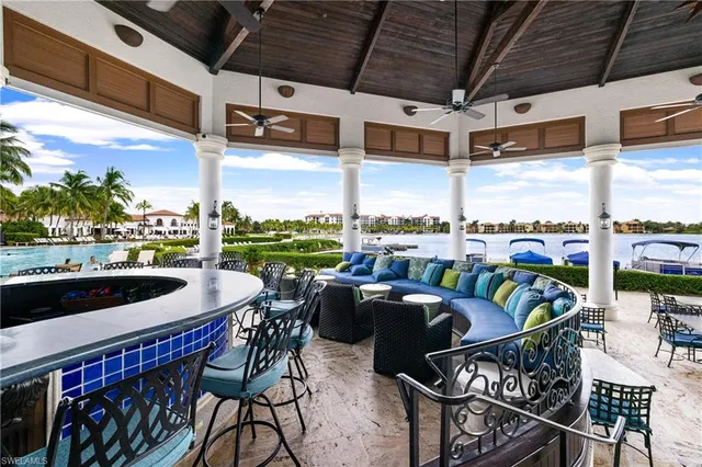 a view of a swimming pool with a patio