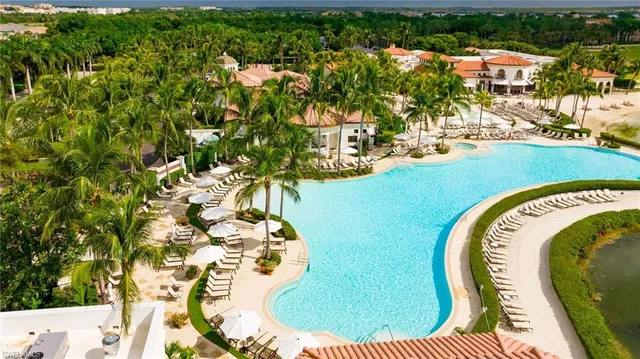 a view of a yard with a table and chairs
