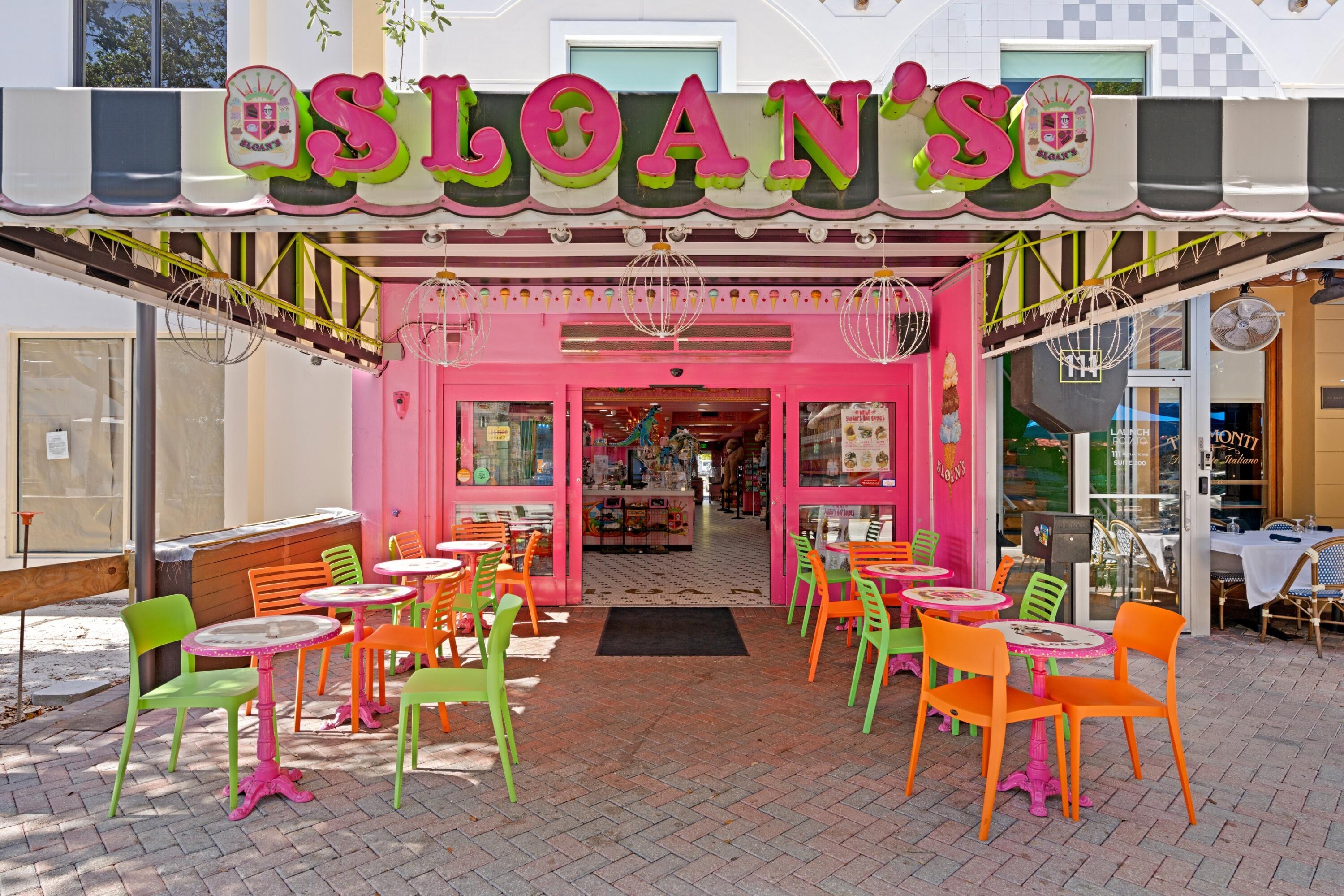 14360 Strathmore Lane, Unit 404 Delray Beach, FL 33446 - Photo 38 of 42 an outdoor sitting area with chairs