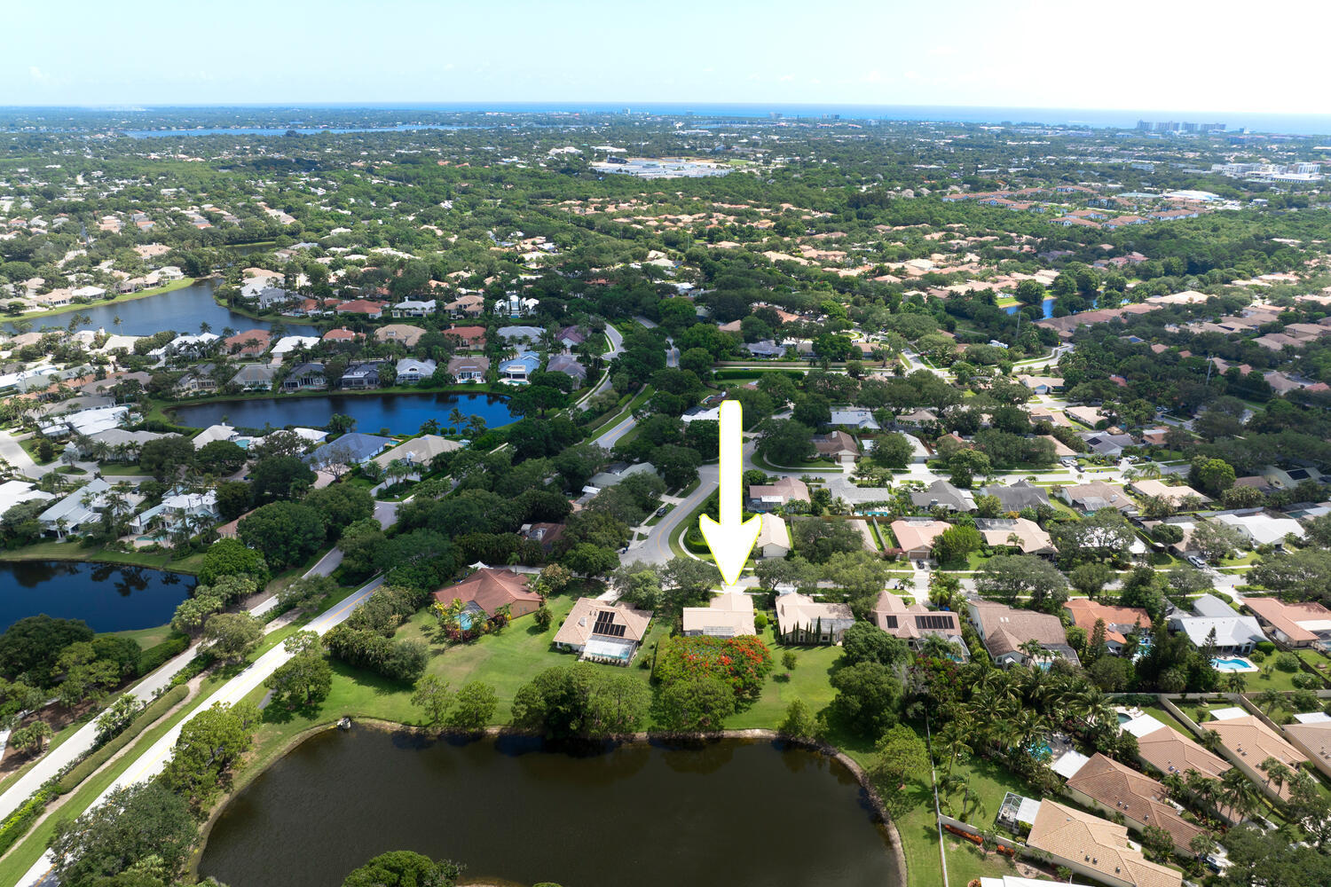 166 Bayberry Circle Jupiter, FL 33458 - Photo 31 of 37 an aerial view of city and lake