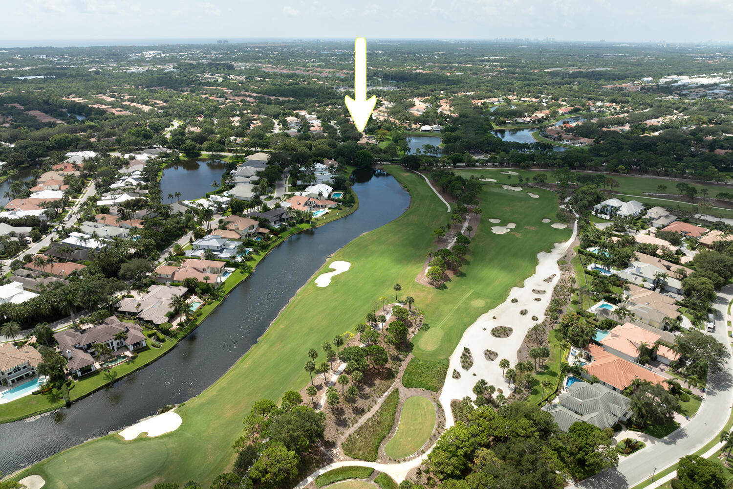 166 Bayberry Circle Jupiter, FL 33458 - Photo 32 of 37 an aerial view of lake residential house with outdoor space