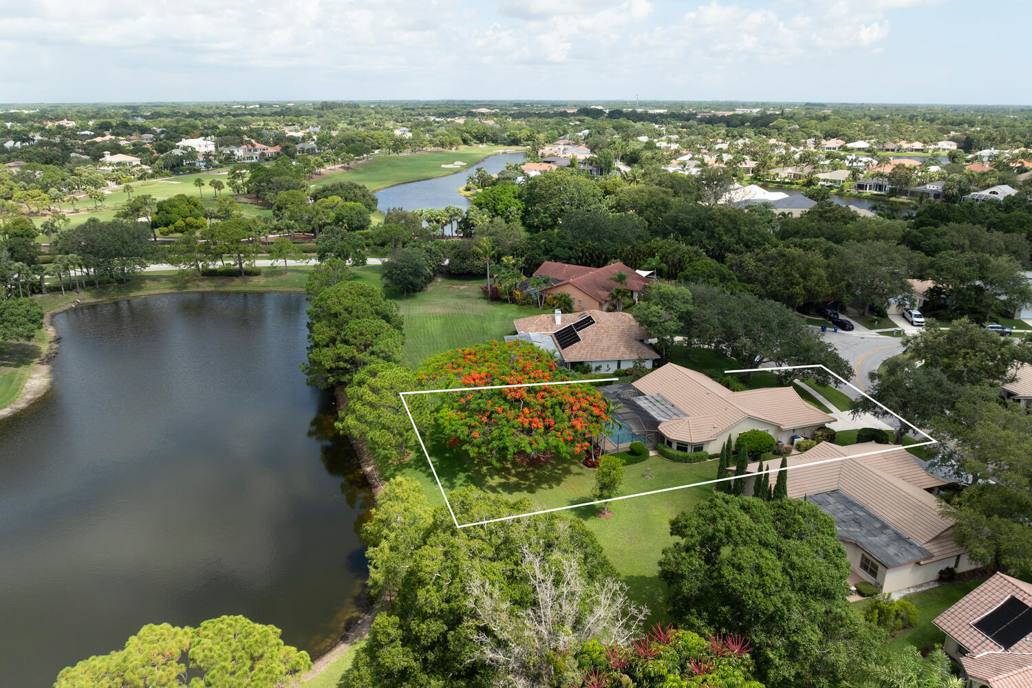 166 Bayberry Circle Jupiter, FL 33458 - Photo 35 of 37 an aerial view of residential houses with outdoor space and lake view