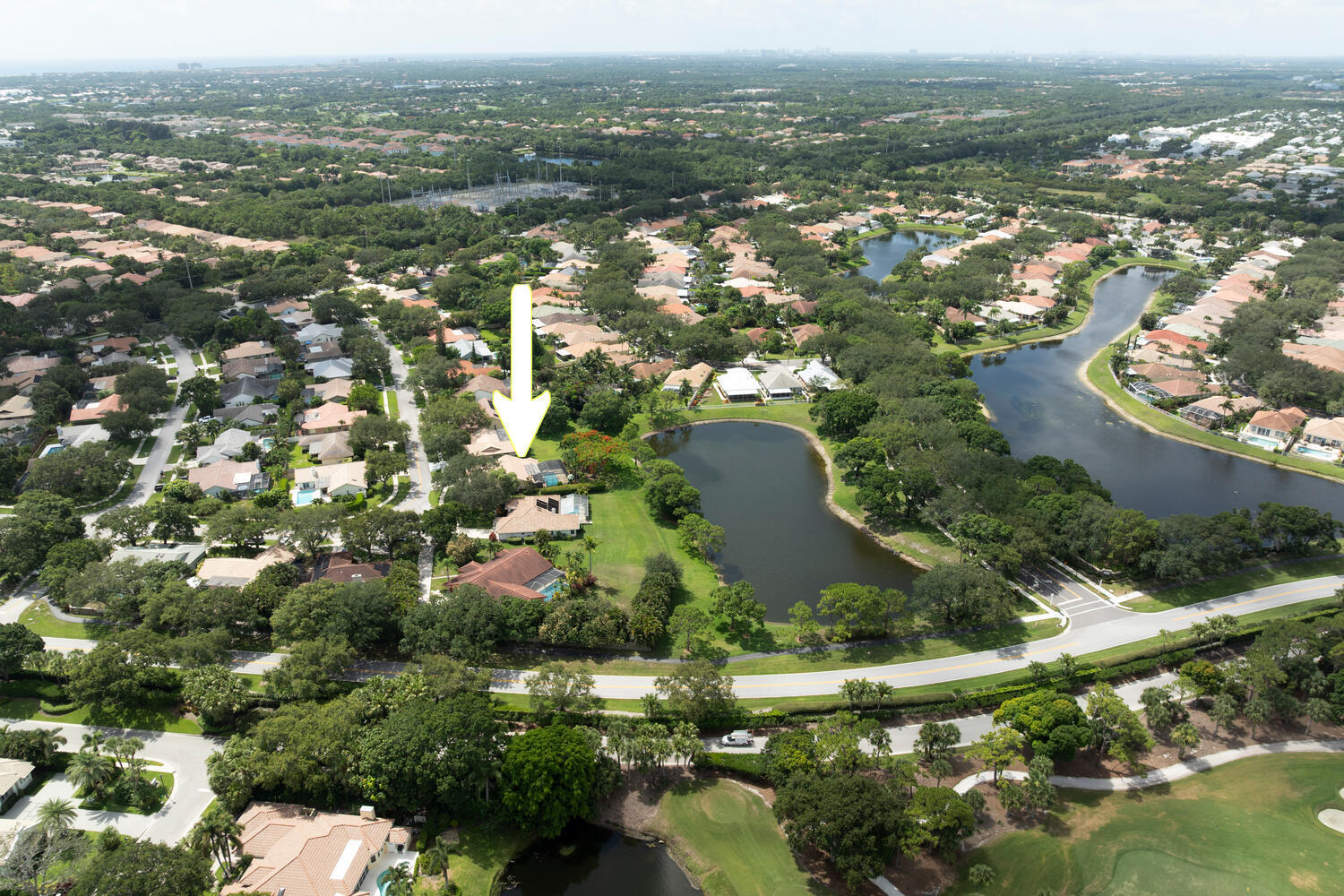 166 Bayberry Circle Jupiter, FL 33458 - Photo 36 of 37 an aerial view of city and lake