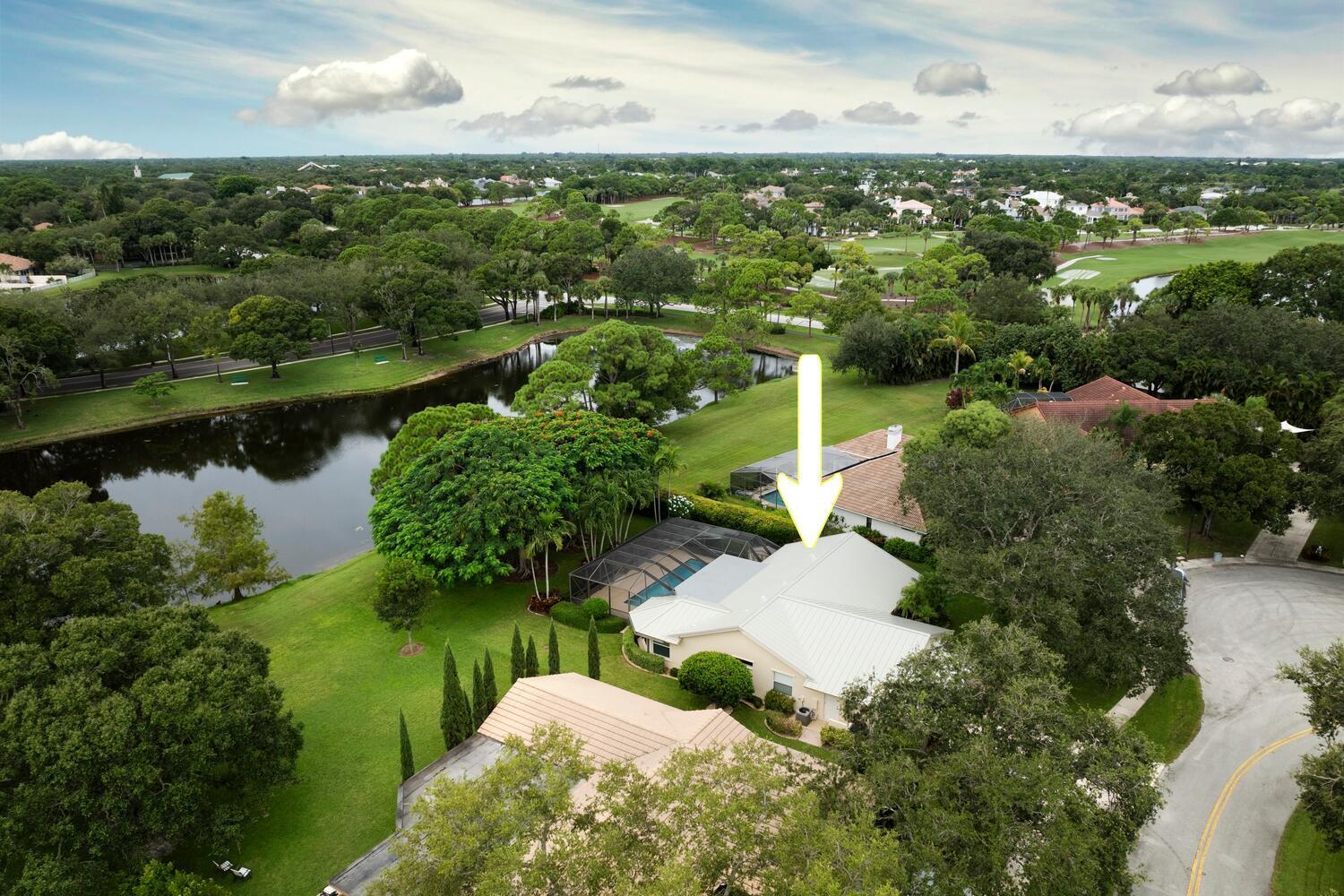 166 Bayberry Circle Jupiter, FL 33458 - Photo 6 of 37 an aerial view of residential houses with outdoor space and river