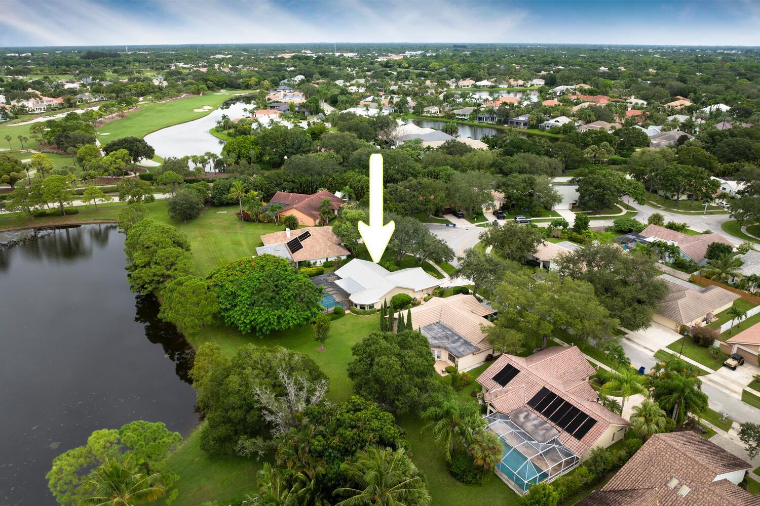 166 Bayberry Circle Jupiter, FL 33458 - Photo 8 of 37 an aerial view of residential houses with outdoor space and lake view