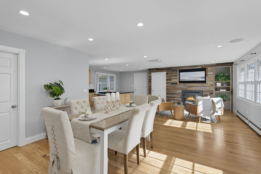 5 Charles Street Georgetown, MA 01833 - Photo 17 of 36 a dining room with furniture wooden floor and a rug
