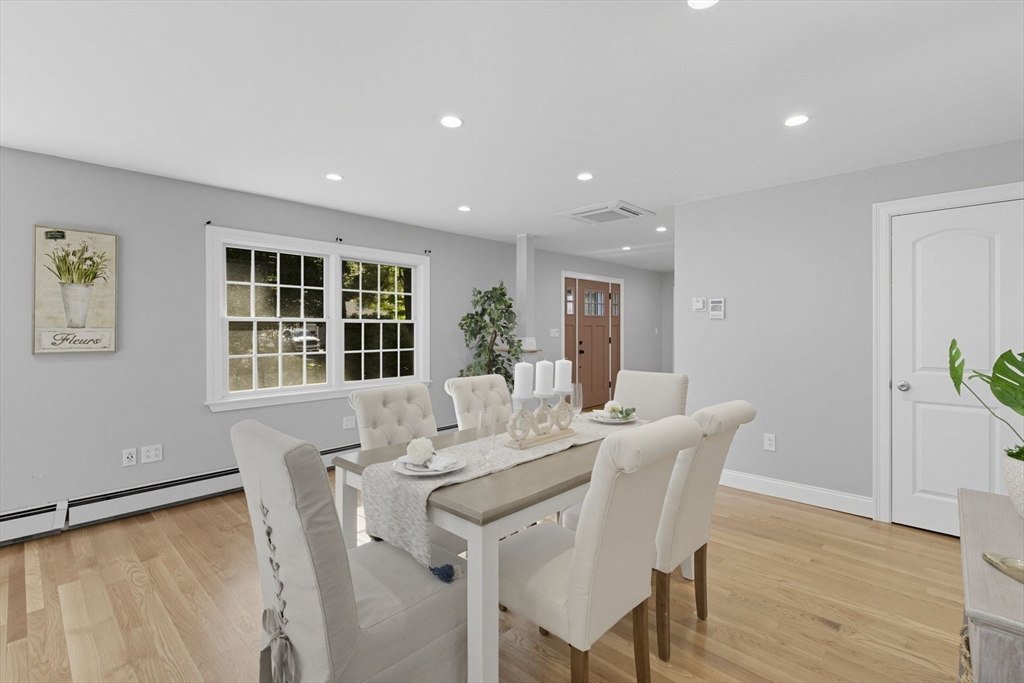 5 Charles Street Georgetown, MA 01833 - Photo 18 of 36 a view of a dining room with furniture window and wooden floor