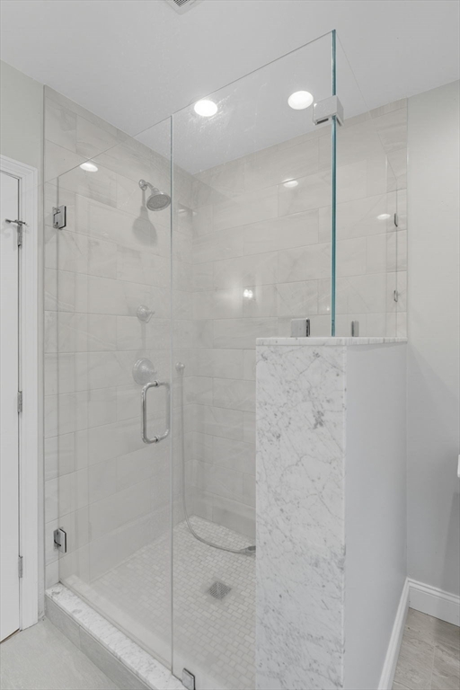 5 Charles Street Georgetown, MA 01833 - Photo 27 of 36 a bathroom with a shower