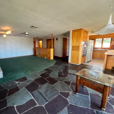 a view of a livingroom with a window