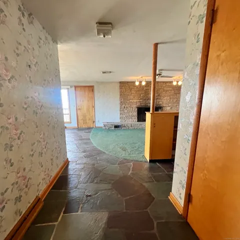 a picture of a bathroom with a sink and a mirror