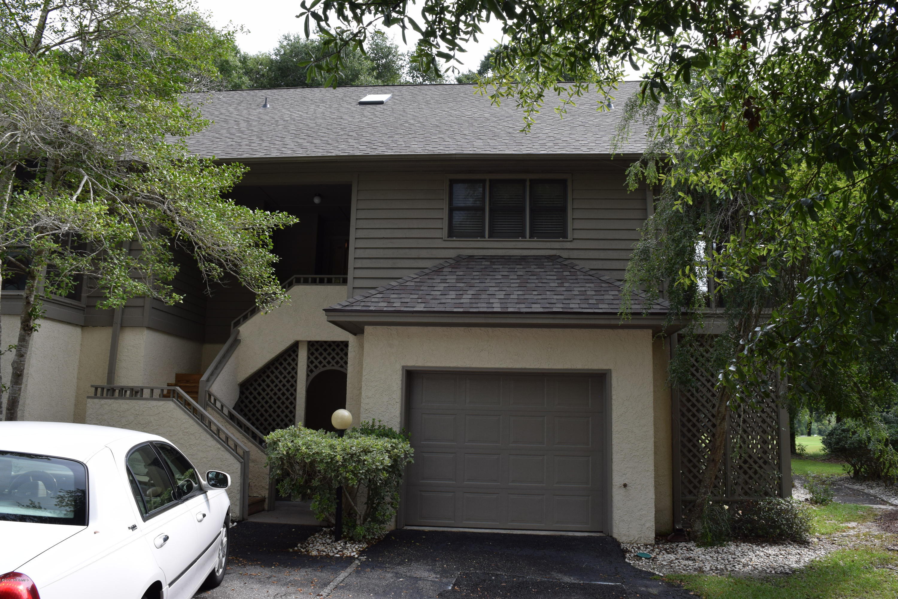 248 Clubhouse Road, Unit A Sunset Beach, NC 28468 - Photo 1 of 38 Front