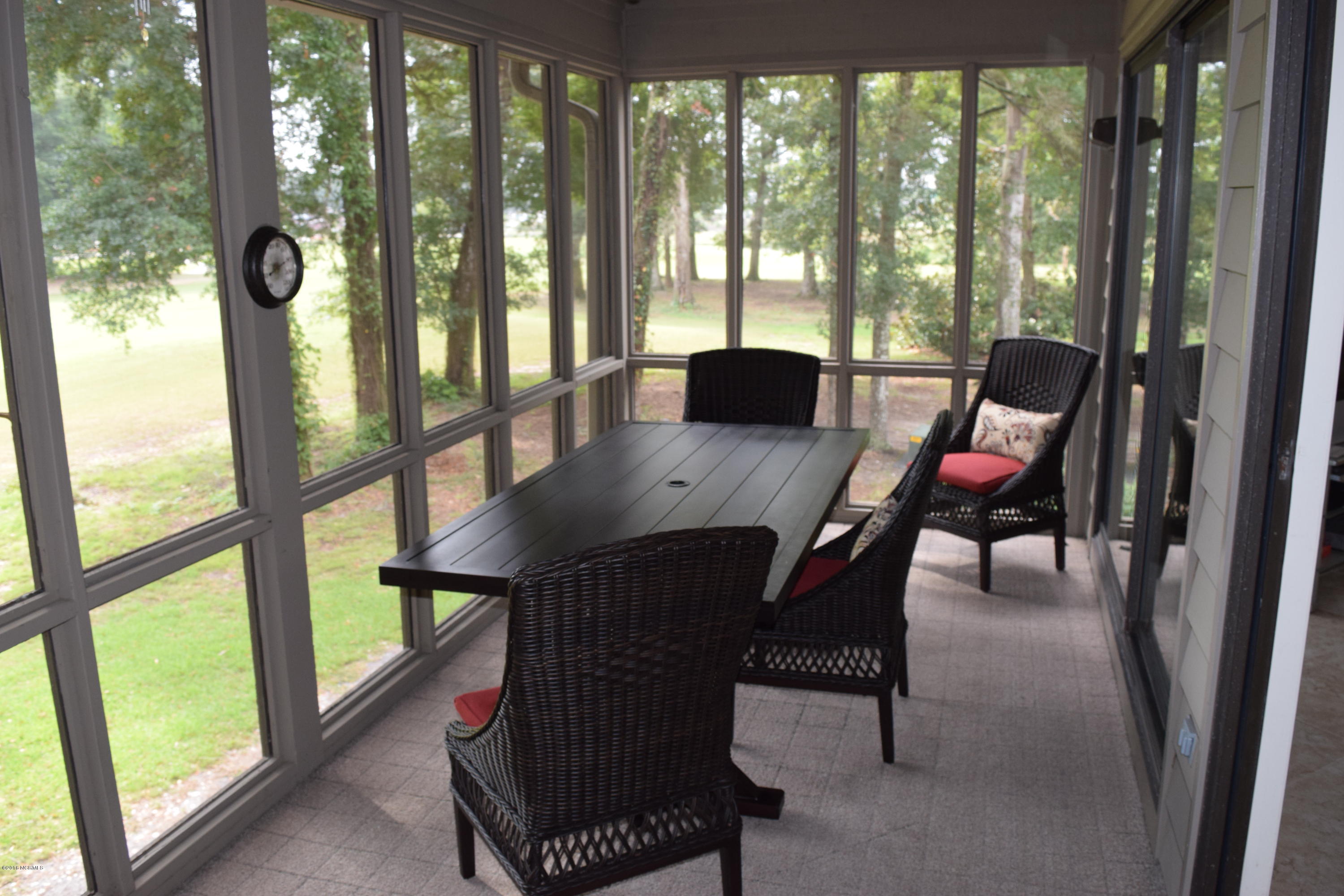 248 Clubhouse Road, Unit A Sunset Beach, NC 28468 - Photo 14 of 38 Perfect Screen Porch