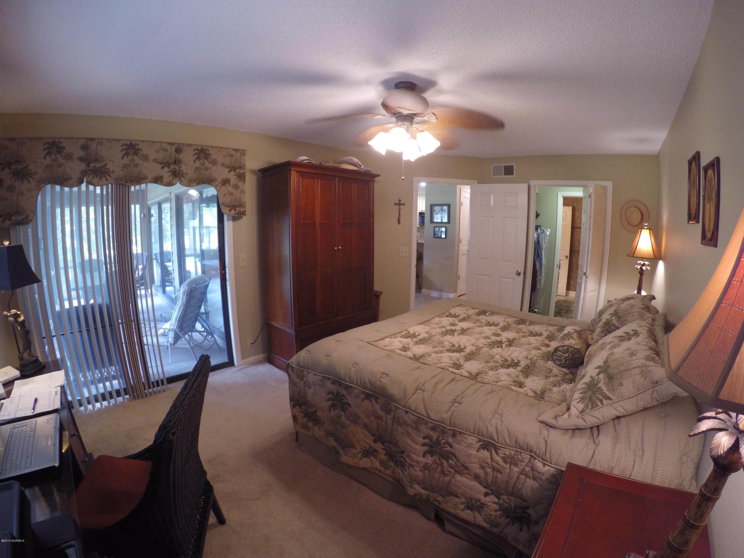 248 Clubhouse Road, Unit A Sunset Beach, NC 28468 - Photo 16 of 38 King Size Bed