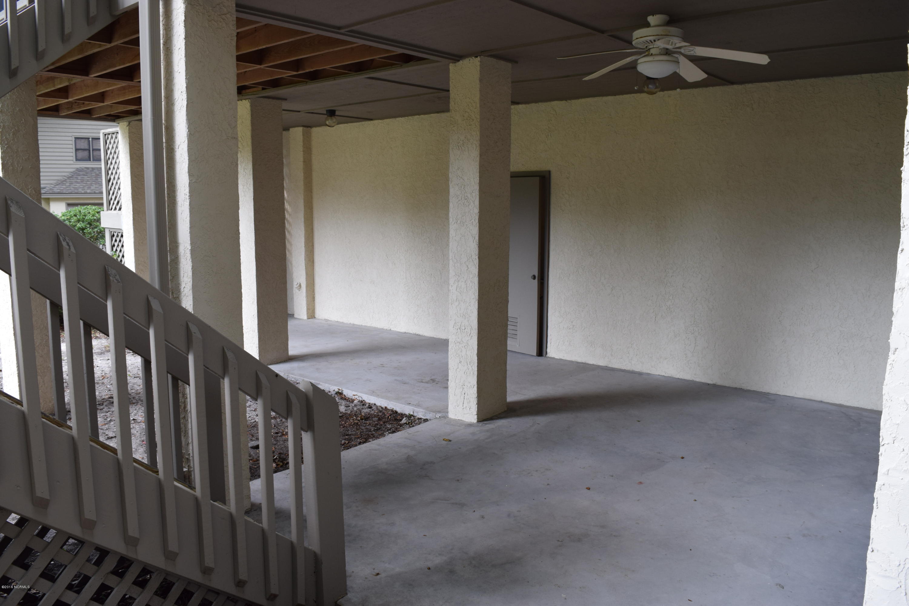 248 Clubhouse Road, Unit A Sunset Beach, NC 28468 - Photo 34 of 38 Covered Patio