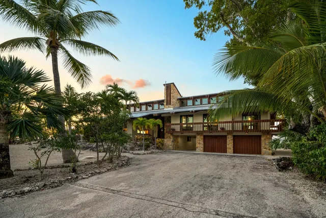 a kitchen with a sink a counter top space and appliances