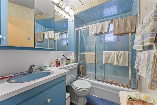 a bathroom with a sink and toilet