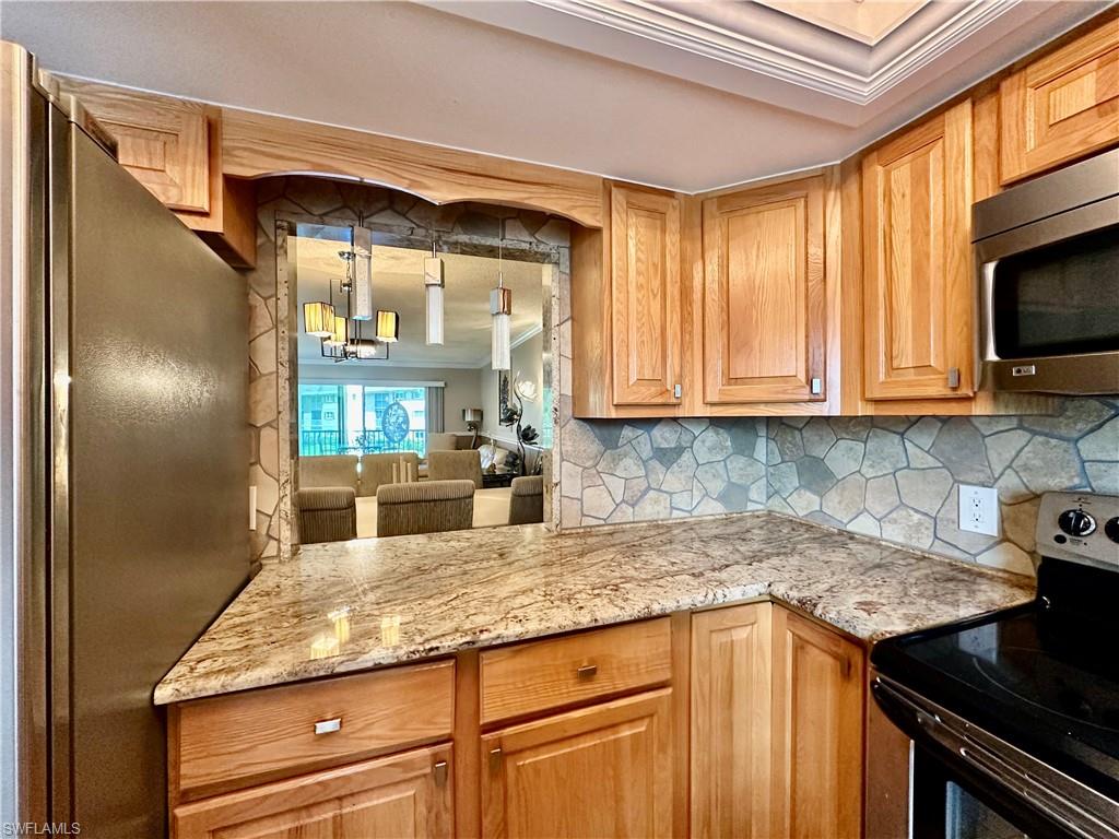 5467 Rattlesnake Hammock Road, Unit 207 Naples, FL 34113 - Photo 7 of 27