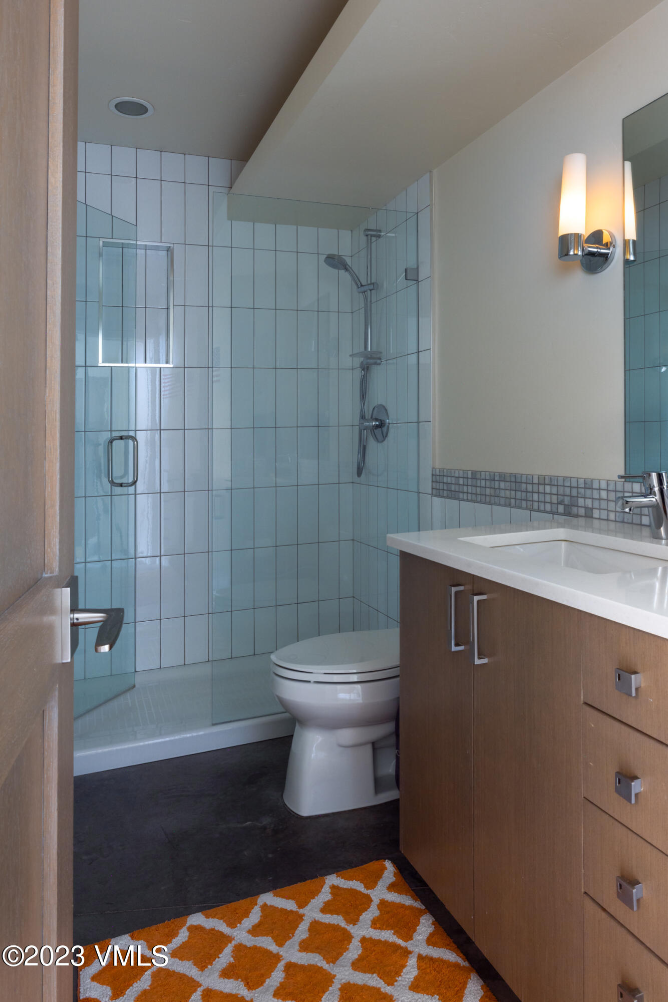 1793 Beard Creek Trail Edwards, CO 81632 - Photo 23 of 28 a bathroom with a sink a toilet and shower