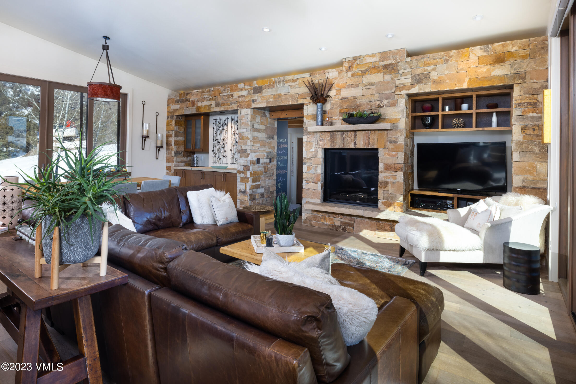 1793 Beard Creek Trail Edwards, CO 81632 - Photo 9 of 28 a living room with furniture fireplace and flat screen tv