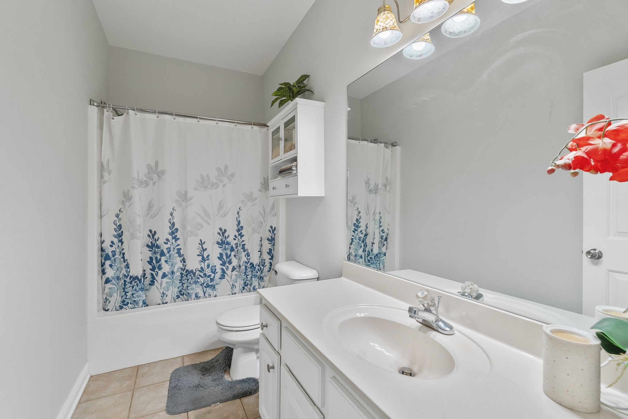2402 Verona Place Murfreesboro, TN 37130 - Photo 28 of 41 a bathroom with a sink toilet and shower