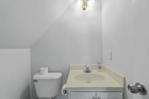 a bathroom with a sink and a toilet