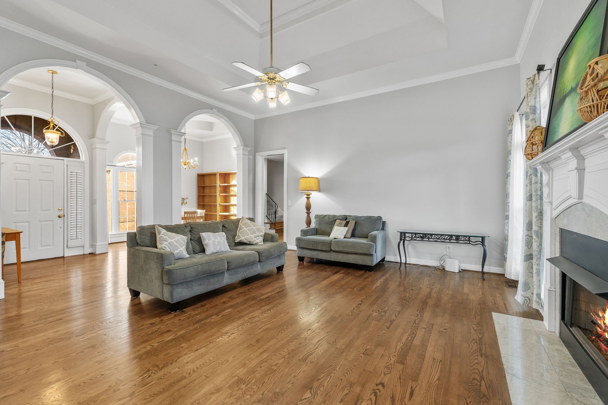 2402 Verona Place Murfreesboro, TN 37130 - Photo 9 of 41 a living room with furniture and a fireplace