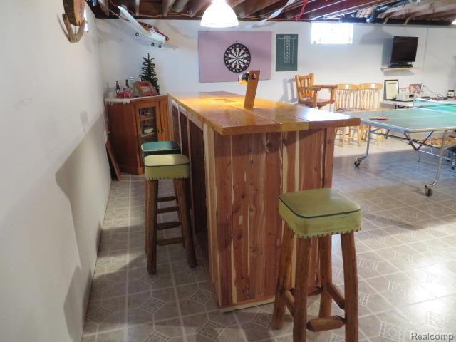 67430 Haven Ridge Road New Haven, MI 48050 - Photo 27 of 28 Dry bar in basement.jpg