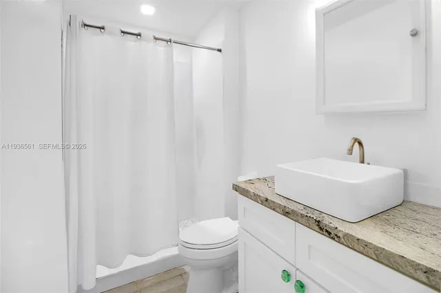 a bathroom with a toilet