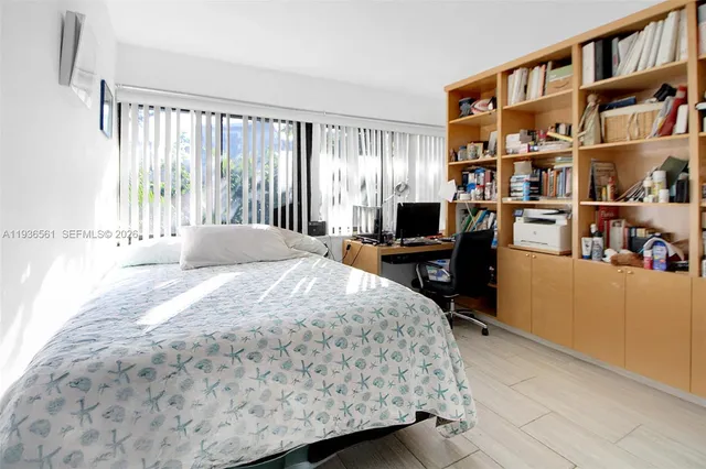 a view of a backyard with sitting area