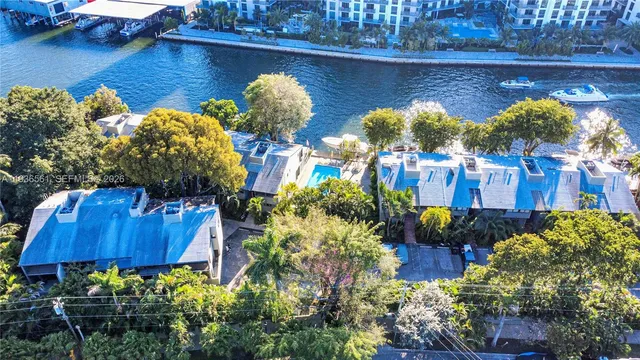 a view of a lake with sitting area