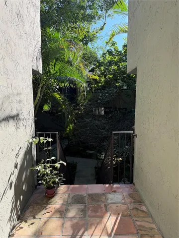 a view of a backyard of a house