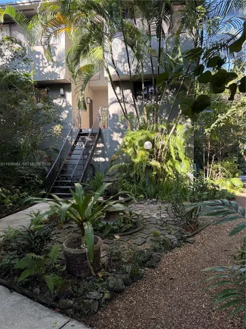 a view of a house with swimming pool