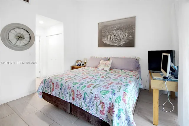 a view of a hallway with staircase