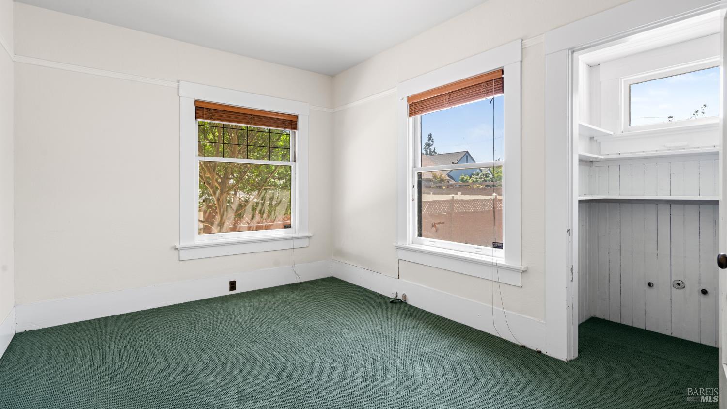 563 Jefferson Street Napa, CA 94559 - Photo 18 of 55 an empty room with windows