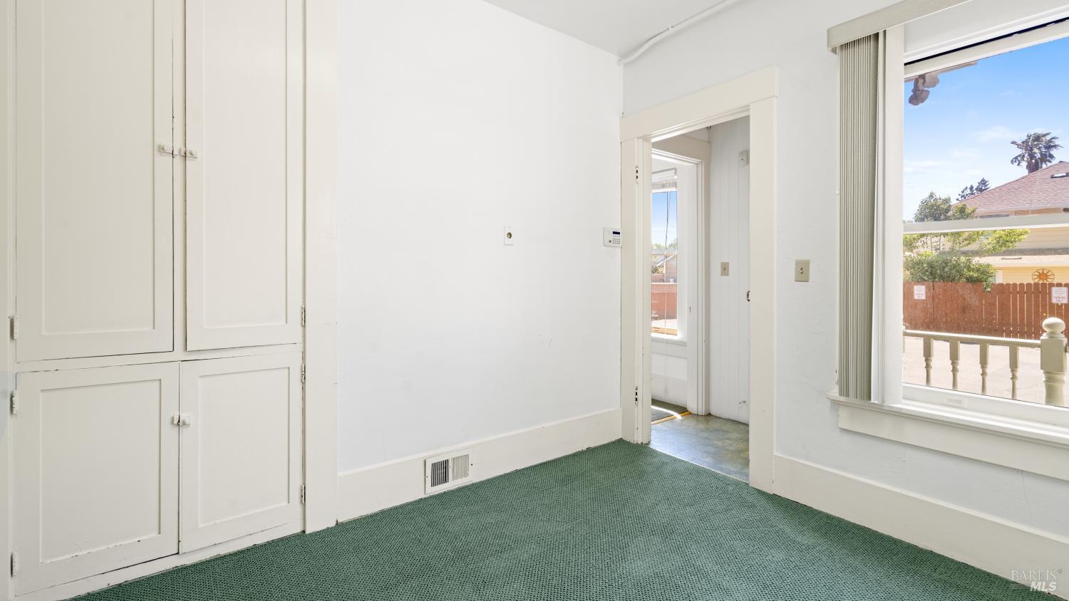 563 Jefferson Street Napa, CA 94559 - Photo 23 of 55 a view of an empty room with a window