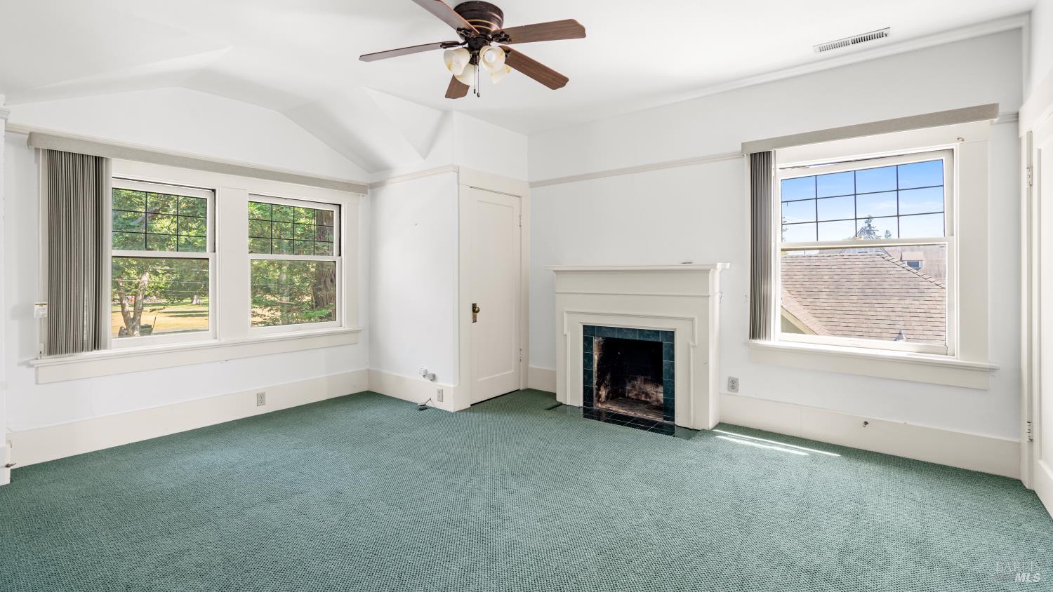 563 Jefferson Street Napa, CA 94559 - Photo 28 of 55 a view of empty room with fireplace and windows