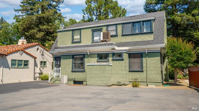 a bathroom with a shower and a mirror