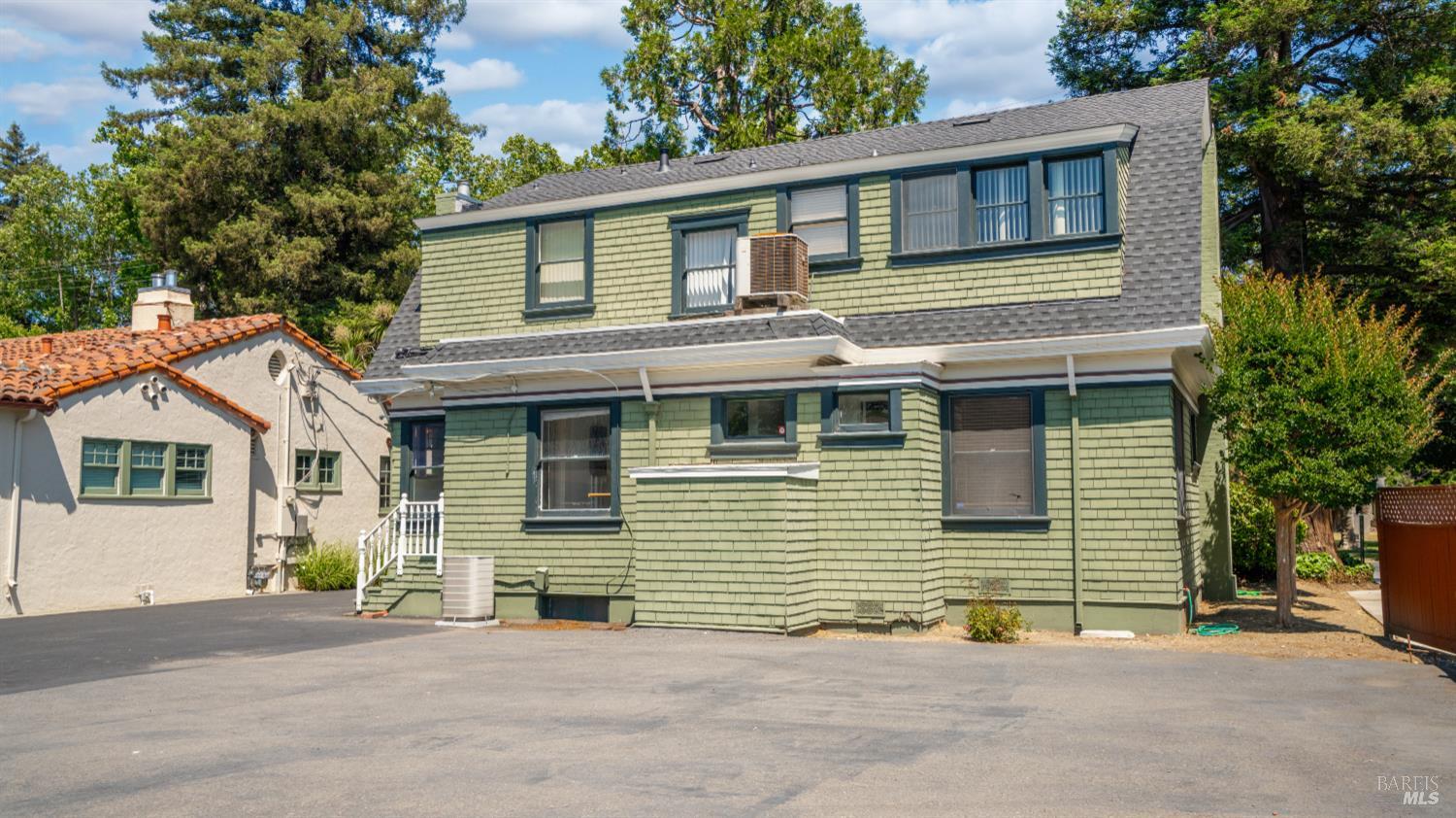 563 Jefferson Street Napa, CA 94559 - Photo 42 of 55 a front view of a house with a garage