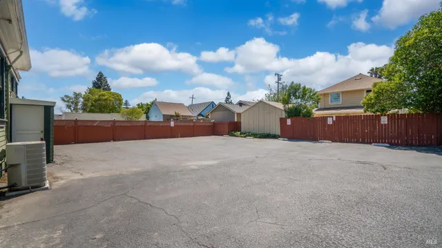 an aerial view of a city with lots of residential buildings