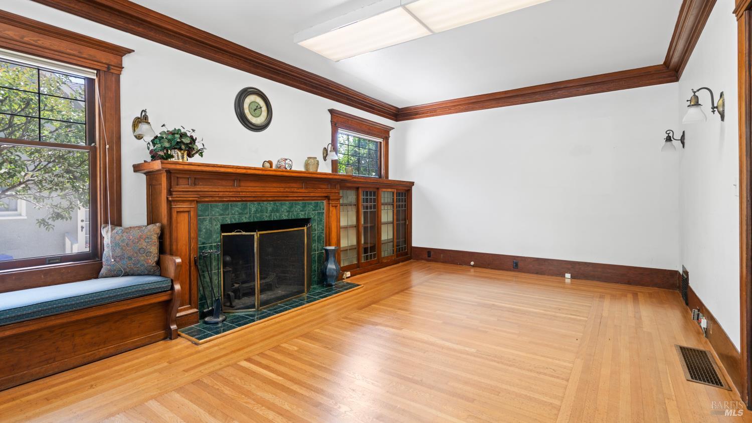563 Jefferson Street Napa, CA 94559 - Photo 7 of 55 a view of an empty room with a fireplace and a window
