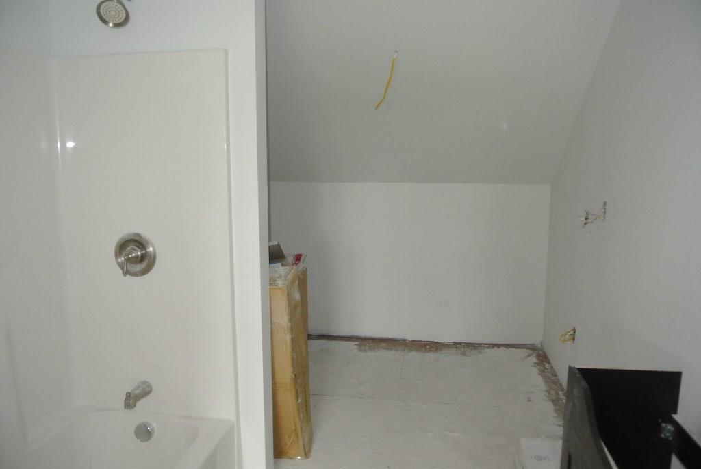 527 Wingood Road Windsor, ME 04363 - Photo 30 of 33 Above the garage bathroom