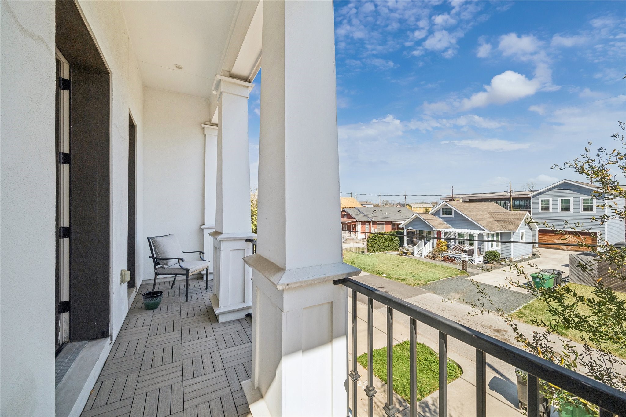 1311 Laird Street Houston, TX 77008 - Photo 23 of 28 Enjoy morning coffee or after-dinner drinks on the primary suite’s wide east-facing balcony.